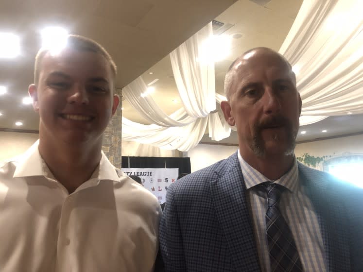 Jeffrey Persi (left) of JSerra is a 6-foot-7, 270-pound offensive line. His coach, Pat Harlow, was an NFL lineman and star at USC.