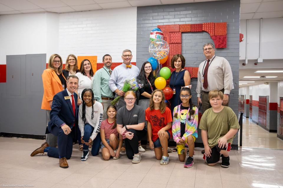 Students and staff celebrate Wright as she gets the Beginning Teacher of the Year award.