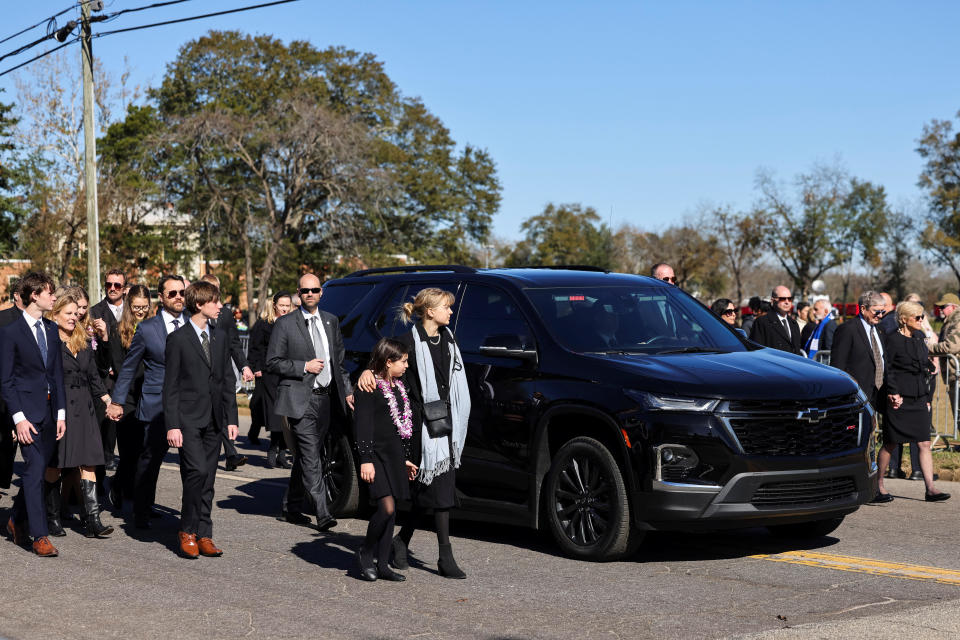 Family and invited guests walked with the funeral procession. / Credit: ELIJAH NOUVELAGE / REUTERS