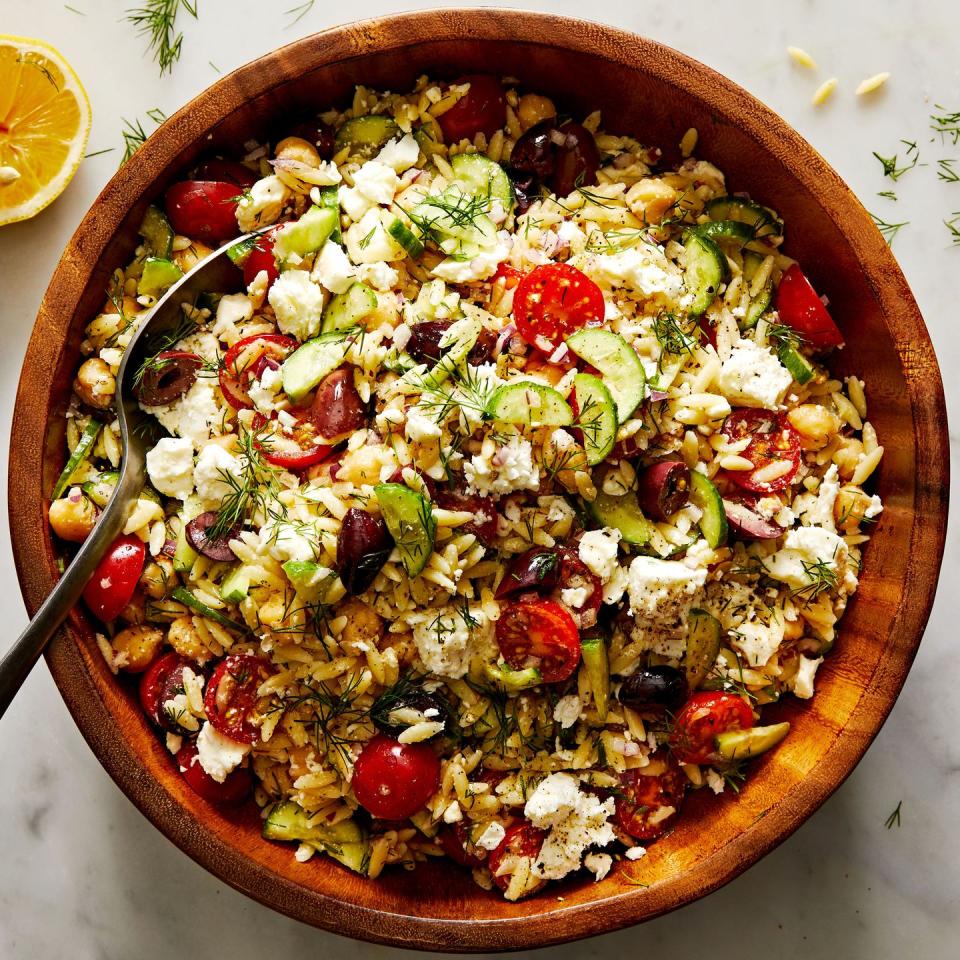 greek orzo salad with olives, cucumber, tomatoes, feta, and fresh dill