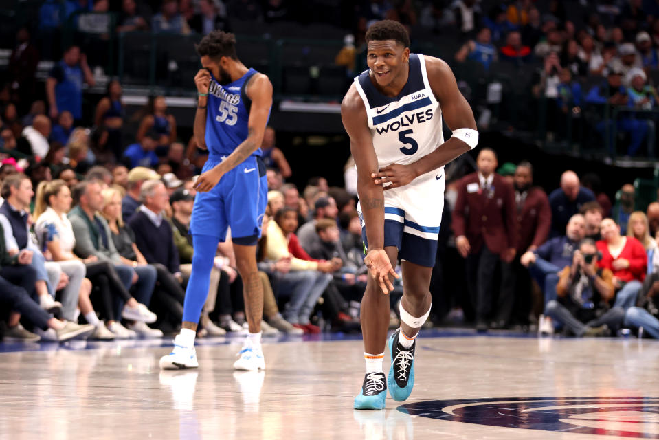 DALLAS, TEXAS - DECEMBER 14: Anthony Edwards #5 of the Minnesota Timberwolves reacts after a three point basket in the second half at American Airlines Center on December 14, 2023 in Dallas, Texas. NOTE TO USER: User expressly acknowledges and agrees that, by downloading and or using this photograph, User is consenting to the terms and conditions of the Getty Images License Agreement. (Photo by Tim Heitman/Getty Images)