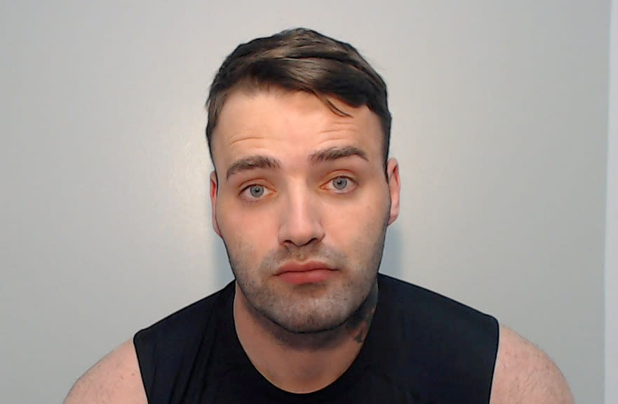 Tyler Lowe, 28, strangled his partner and suffocated her with a pillow. (SWNS)