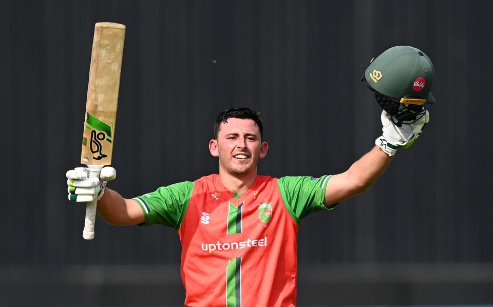 Harry Swindells celebrates reaching his century