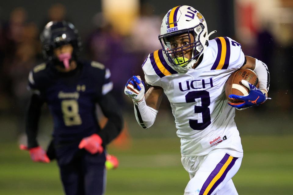 Union County receiver Gavin Jenkins races to the end zone for a touchdown against University Christian.