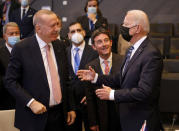 U.S. President Joe Biden, right, speaks with Turkey's President Recep Tayyip Erdogan during a plenary session at a NATO summit in Brussels, Monday, June 14, 2021. U.S. President Joe Biden is taking part in his first NATO summit, where the 30-nation alliance hopes to reaffirm its unity and discuss increasingly tense relations with China and Russia, as the organization pulls its troops out after 18 years in Afghanistan. (AP Photo/Olivier Matthys, Pool)