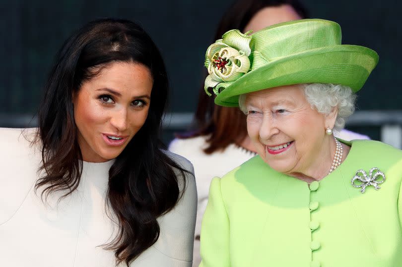 Meghan, Duchess of Sussex and Queen Elizabeth II.