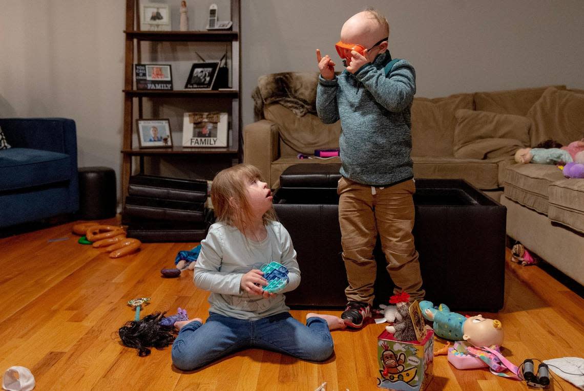 Crosby Orlando, a Shawnee Mission special education student, plays with his friend Lillyan Tischhauser at her home in Shawnee.