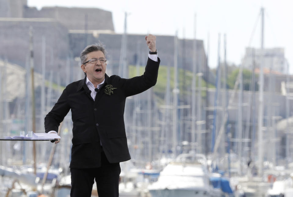 French hard-left presidential candidate, Jean-Luc Melenchon, speaks during a campaign rally in Marseille's Old Port, southern France, Sunday, April 9, 2017. The two-round presidential election is set for April 23 and May 7. (AP Photo/Claude Paris)