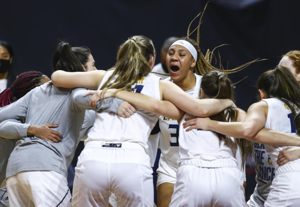 California Baptist's Britney Thomas (32) huddles with teammates before an NCAA college basketball game against Grand Canyon for the championship of the Western Athletic Conference women's tournament Saturday, March 13, 2021, in Las Vegas. (AP Photo/Chase Stevens)