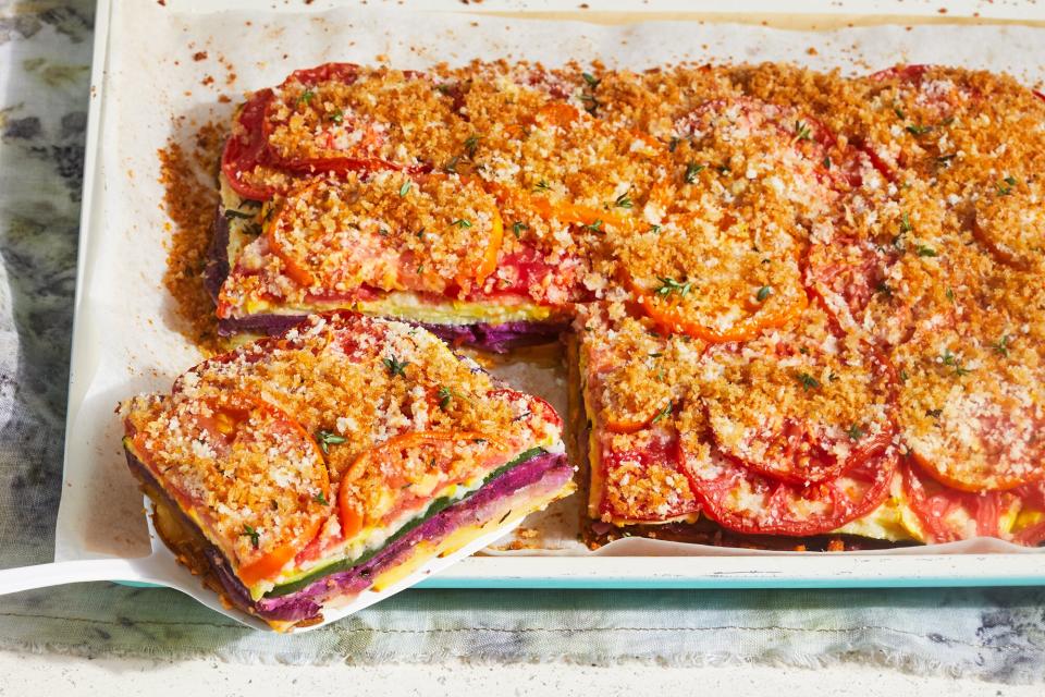 rainbow vegetable gratin with slice being removed