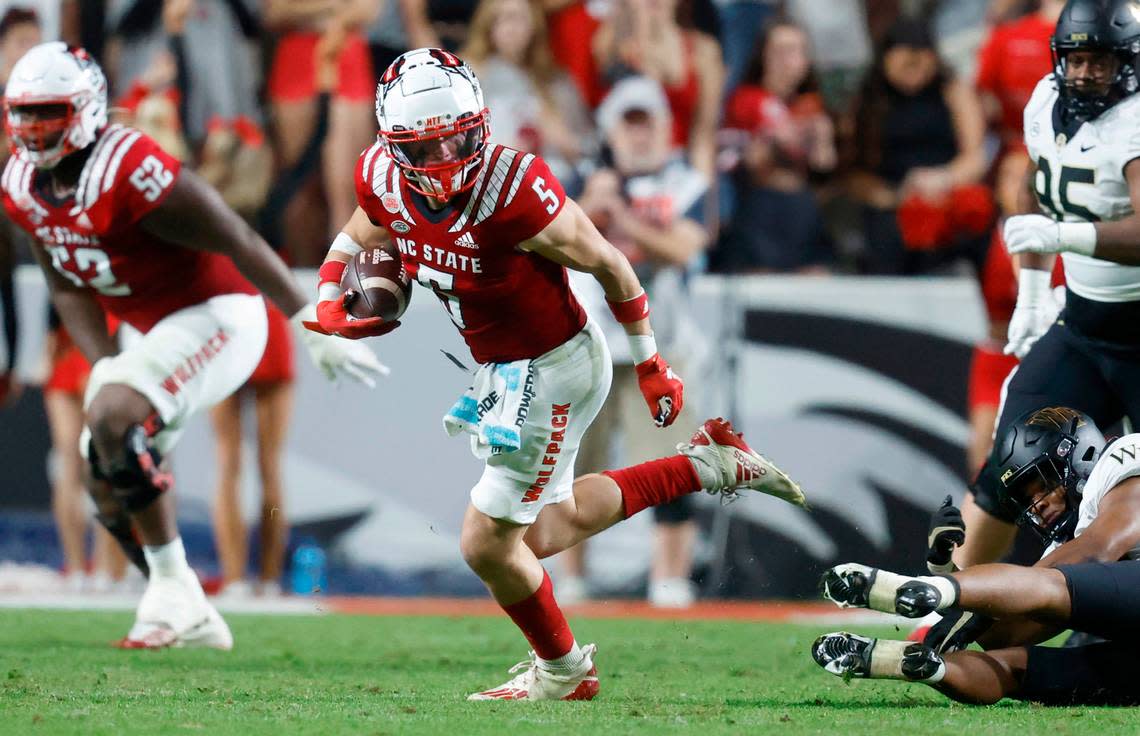 N.C. State wide receiver Thayer Thomas (5) breaks free during the second half of N.C. State’s 30-21 victory over Wake Forest at Carter-Finley Stadium in Raleigh, N.C., Saturday, Nov. 5, 2022.