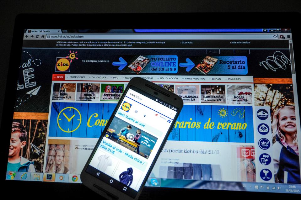 Computer screen and phone screen showing a retailer's webpage