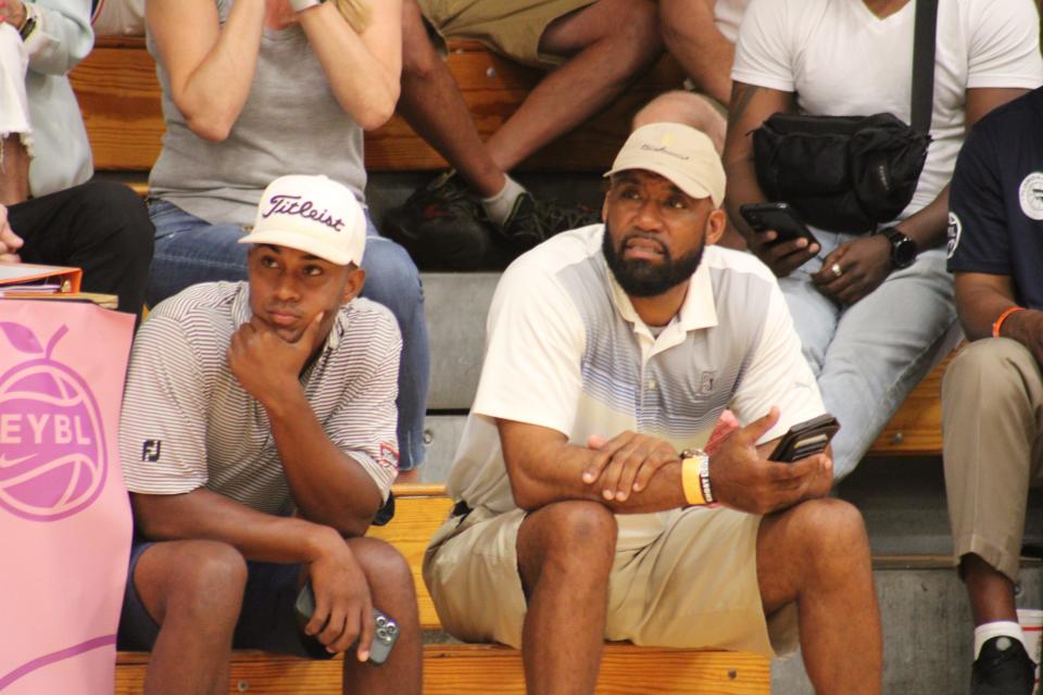 Kevin Knox Sr., right, watches his youngest son, Karter, play in an AAU basketball game at the Nike EYBL Peach Jam on Tuesday, July 4, 2023, in North Augusta, S.C. Knox Sr.'s oldest son, Kevin Knox Jr., was a one-and-done player at Kentucky before being selected as a lottery pick in the 2018 NBA Draft.
