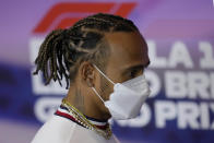 Mercedes driver Lewis Hamilton of Britain wears a face covering during a press conference at the Silverstone race track in Silverstone, Thursday, June 30, 2022. The British F1 Grand Prix is held on Sunday July 3,2022. (AP Photo/Matt Dunham)