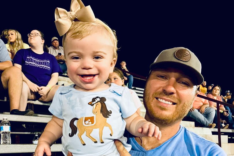 Lydia, pictured with dad Kirk, was thought to be "completely healthy" apart from the odd ear infection, constipation and sleeping problems.