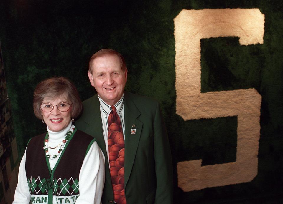 In this 2004 photo, Duane and Judy Vernon' stand in their basement, which was a shrine to Michigan State.