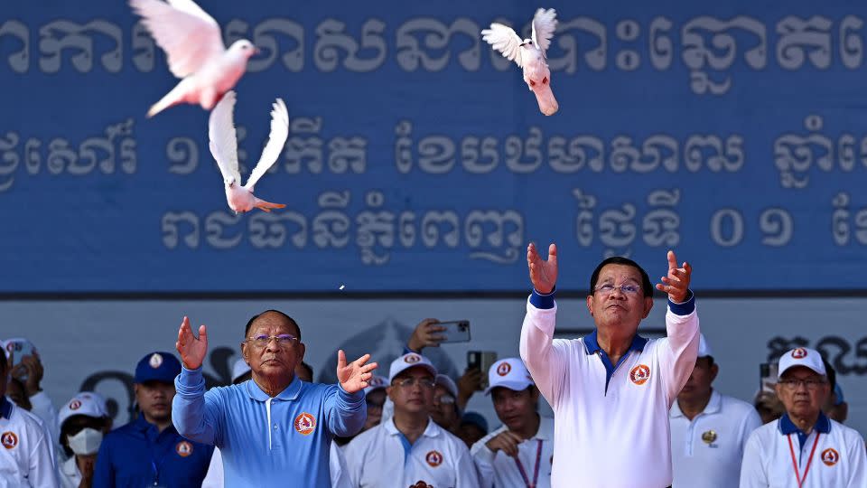 Cambodia's Prime Minister Hun Sen releases doves during a rally for the ruling Cambodian People's Party on July 1, 2023. - Tang Chin Sothy/AFP/Getty Images