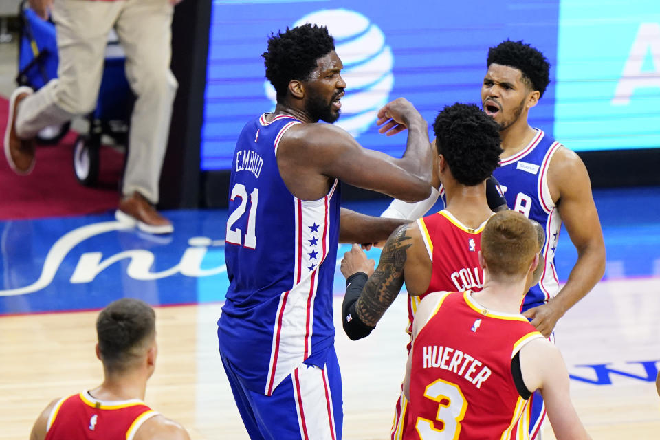 Philadelphia 76ers' Joel Embiid (21) reacts after a foul was called against him during the first half of Game 2 in a second-round NBA basketball playoff series against the Atlanta Hawks, Tuesday, June 8, 2021, in Philadelphia. (AP Photo/Matt Slocum)