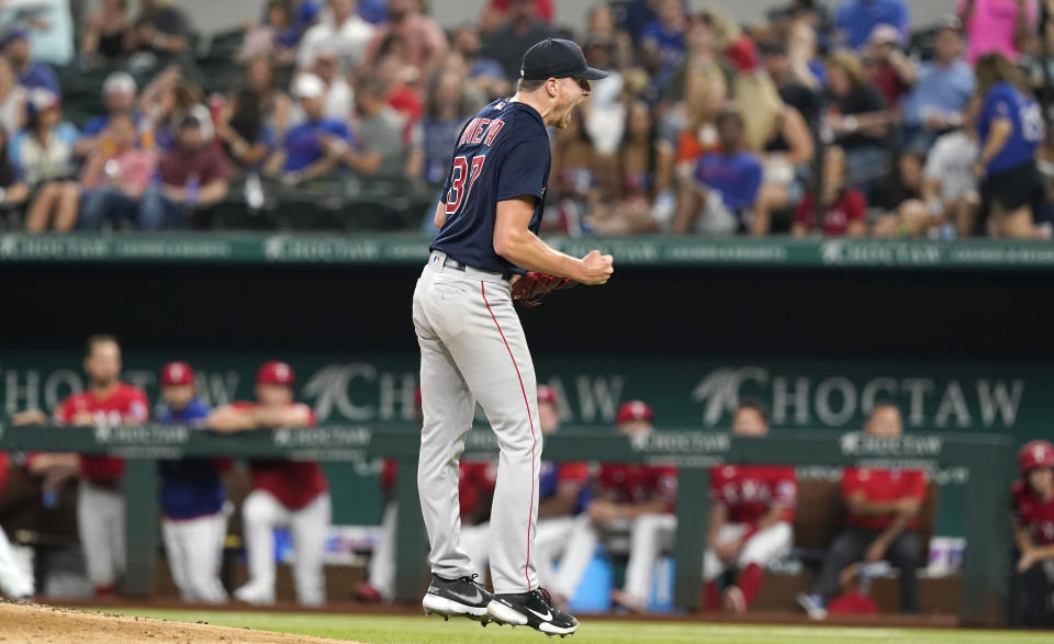Boston Red Sox starting pitcher Nick Pivetta reacts after striking out Texas Rangers Corey Seager to end the sixth inning of a baseball game in Arlington, Texas, Friday, May 13, 2022. (AP Photo/LM Otero)