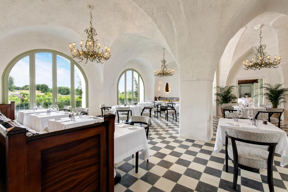 The interior dining area of Carosello restaurant at Masseria Torre Maizza.