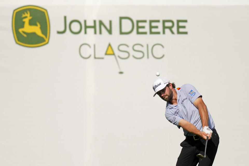 Cameron Young hits to the 18th green during the third round of the John Deere Classic golf tournament, Saturday, July 8, 2023, at TPC Deere Run in Silvis, Ill. (AP Photo/Charlie Neibergall)