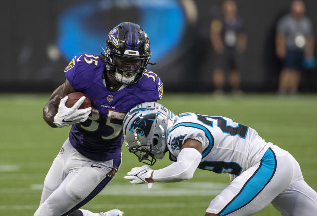 Cornerback Marcus Peters of the Baltimore Ravens tackles wide News Photo  - Getty Images