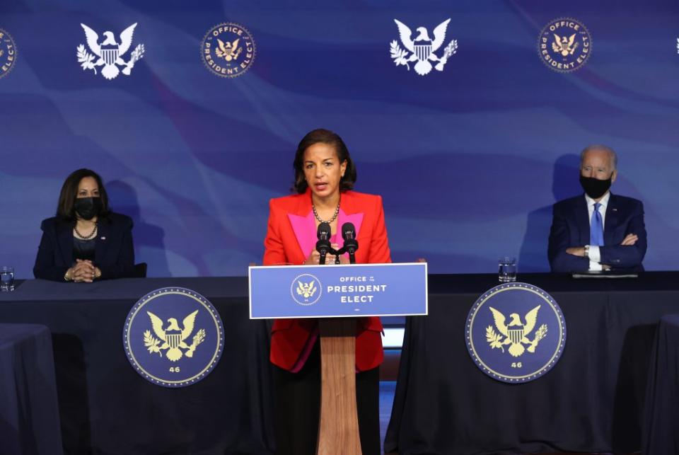 U.S. President-elect Joe Biden (R) and Vice President-elect Kamala Harris (L) look on as former Obama National Security Advisor Susan Rice delivers remarks after being introduced as Biden’s choice to lead his Domestic Policy Council at the Queen Theater on December 11, 2020 in Wilmington, Delaware. (Photo by Chip Somodevilla/Getty Images)