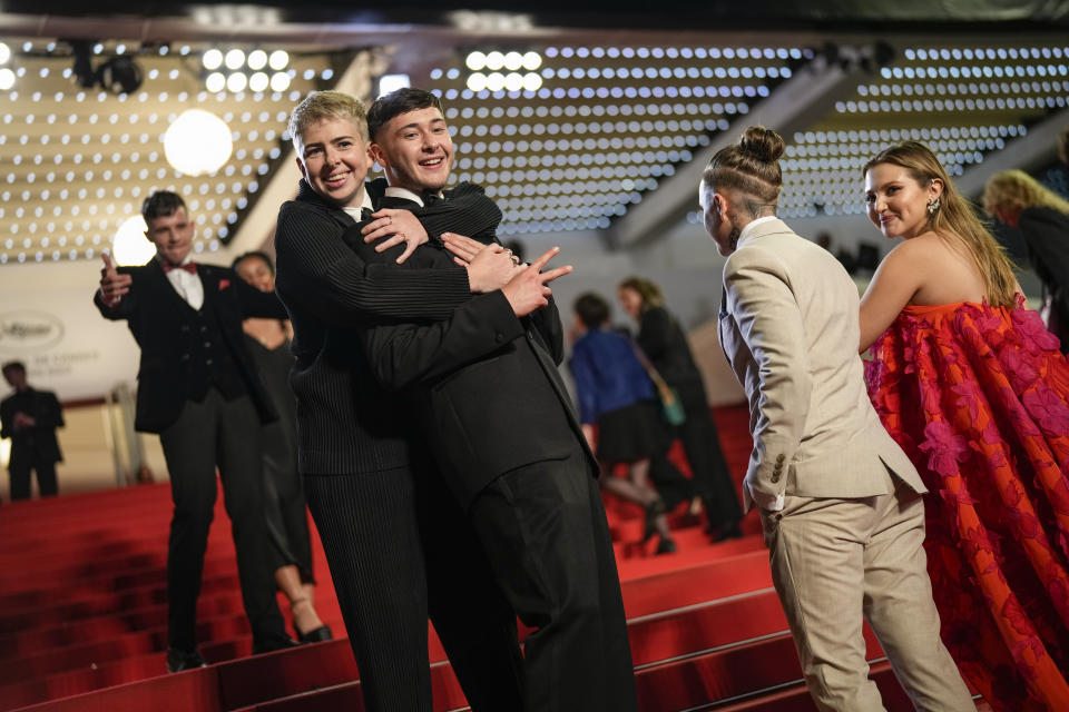 Shaun Thomas, back left, Molly Manning Walker, from front left, Samuel Bottomley, Laura Ambler, and Mia McKenna-Bruce pose for photographers upon arrival at the premiere of the film 'Four Daughters' at the 76th international film festival, Cannes, southern France, Friday, May 19, 2023. (Photo by Scott Garfitt/Invision/AP)