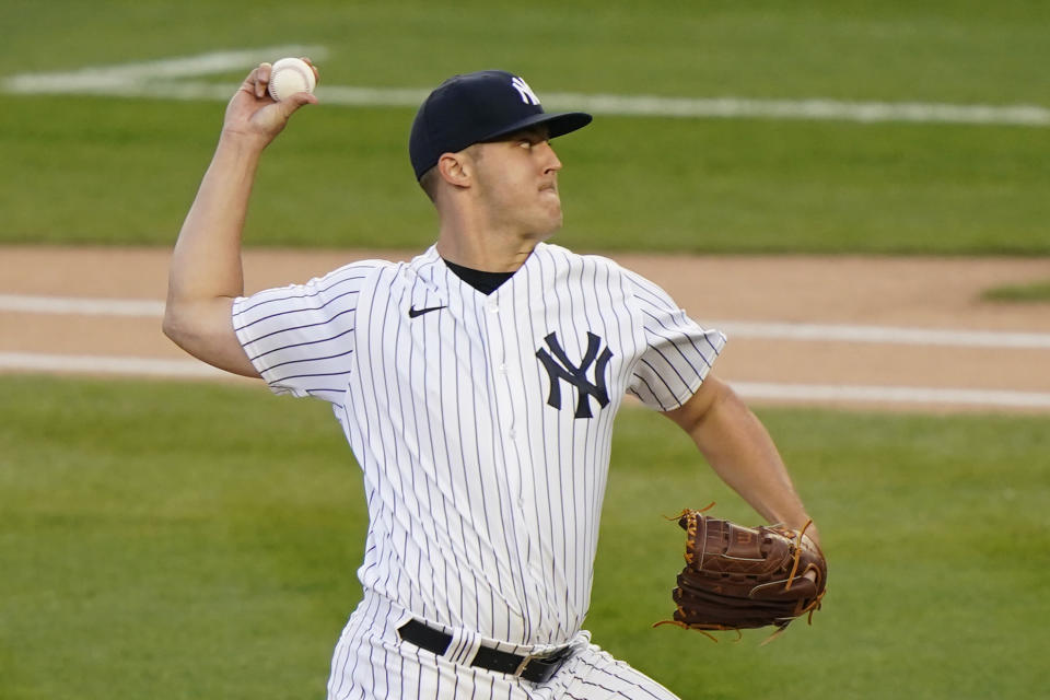 New York Yankees starting pitcher Jameson Taillon winds up during the first inning of the team's baseball game against the Baltimore Orioles, Wednesday, April 7, 2021, at Yankee Stadium in New York. (AP Photo/Kathy Willens)