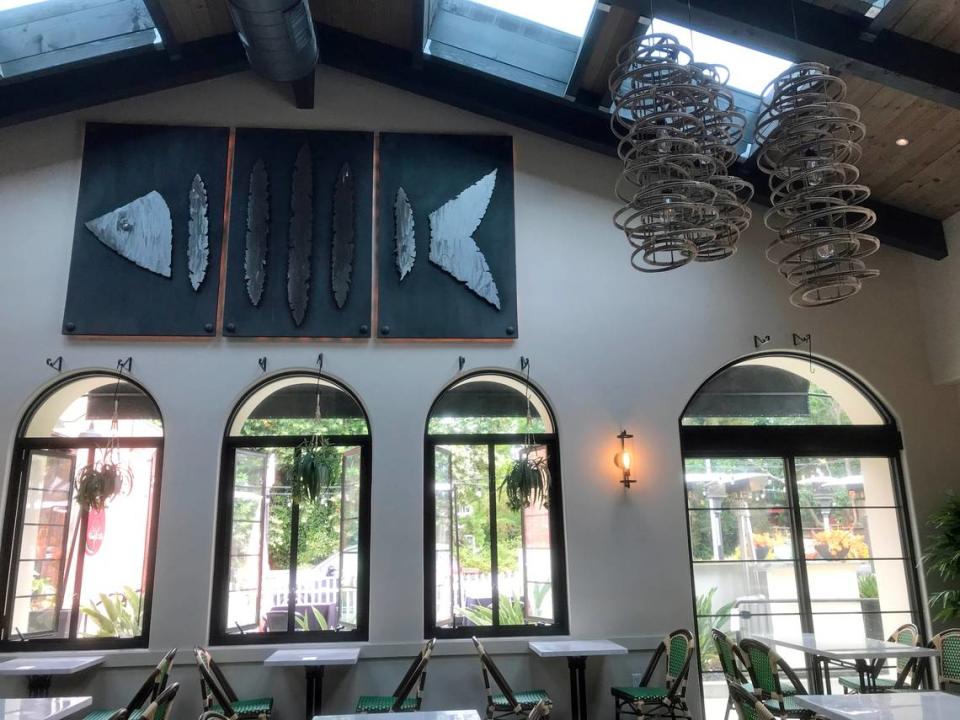 Arched windows, dramatic light fixtures and a triptych fish sculpture set the stage for Bamboo Bamboo Chinese Restaurant in San Luis Obispo’.