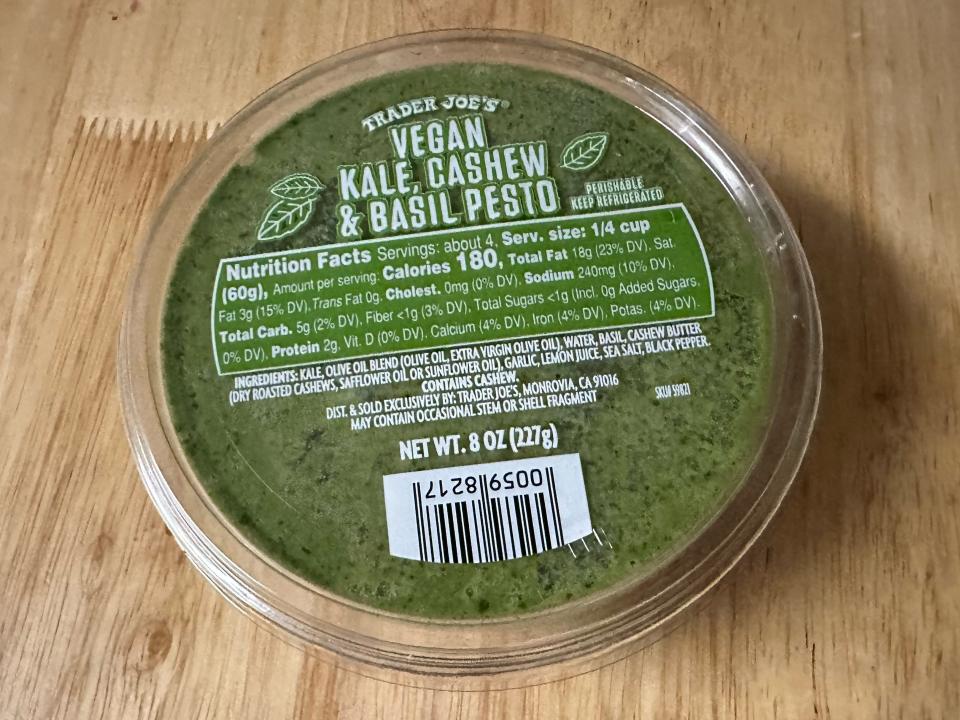 Trader Joe's vegan kale-cashew pesto sits on a table