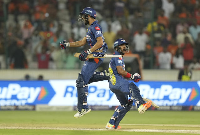 Lucknow Super Giants' Nicholas Pooran, right, and Prerak Mankad leap in air as they celebrate their win during the Indian Premier League cricket match between Sunrisers Hyderabad and Lucknow Super Giants in Hyderabad, Saturday, May 13, 2023. (AP Photo/Mahesh Kumar A.)