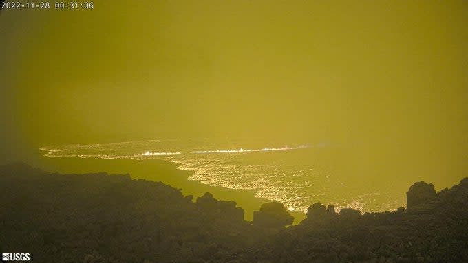 This webcam image released by the US Geological Survey (USGS) on November 28, 2022 courtesy of the National Weather Service, shows the lava in the summit caldera of Mauna Loa (US Geological Survey/AFP via Get)