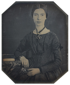 Black white photograph of Emily Dickinson, she wears her hair parted in the middle and a long sleeved black dress.