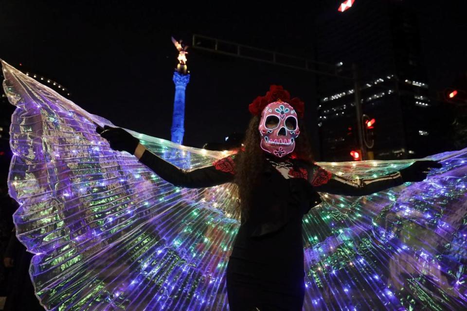 People dressed as “Catrinas” parade down Mexico City’s iconic Reforma avenue during celebrations ahead of the Day of the Dead in Mexico, Sunday, Oct. 22, 2023. 
