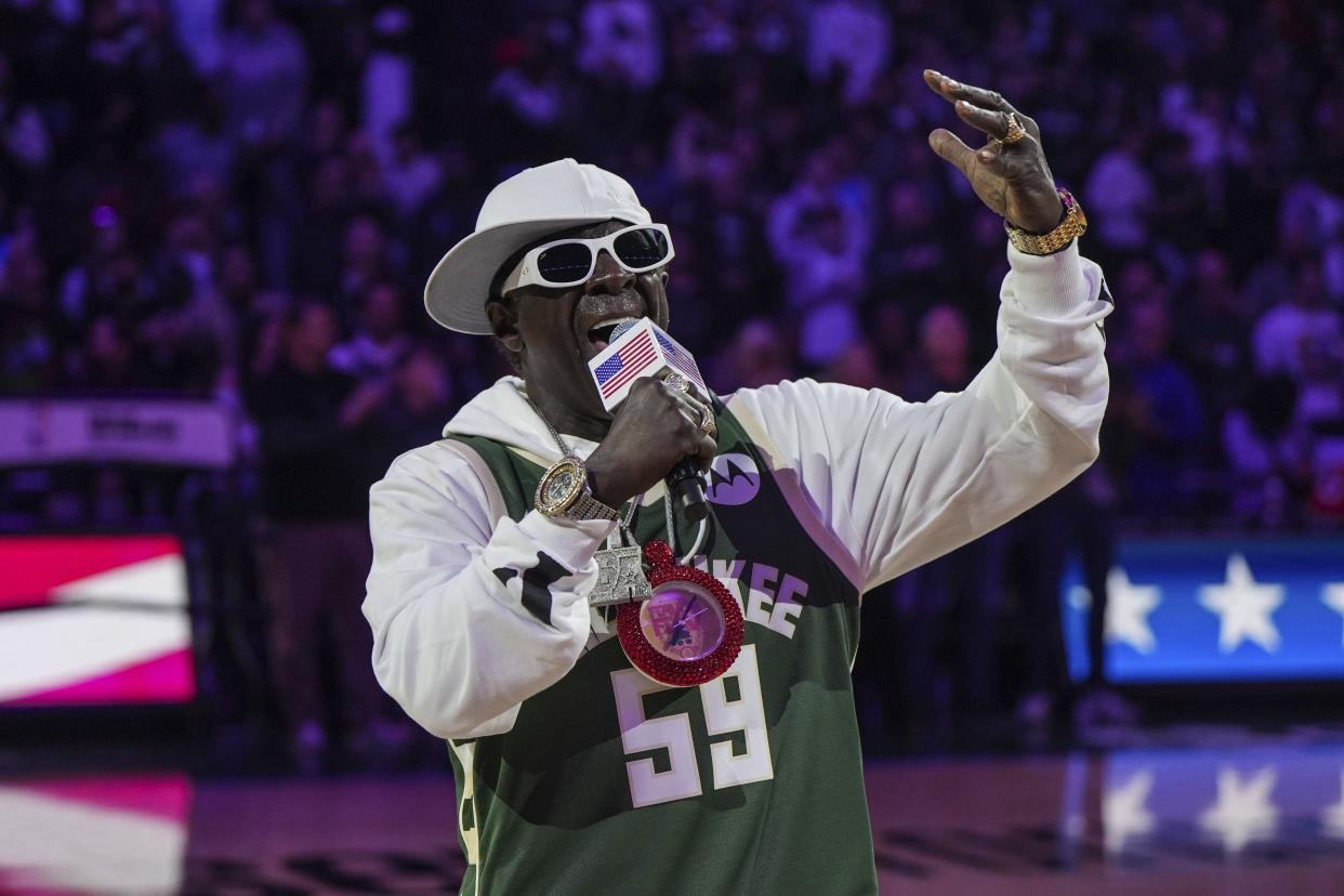 American rapper Flavor Flav performs the national anthem before the Bucks and Hawks NBA basketball game Sunday, Oct. 29, 2023, in Milwaukee. (AP Photo/Kenny Yoo)