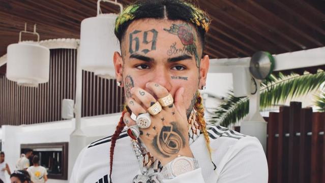 Tekashi 6ix9ine's Girlfriend, Jade, Gets His Face Tattooed Above