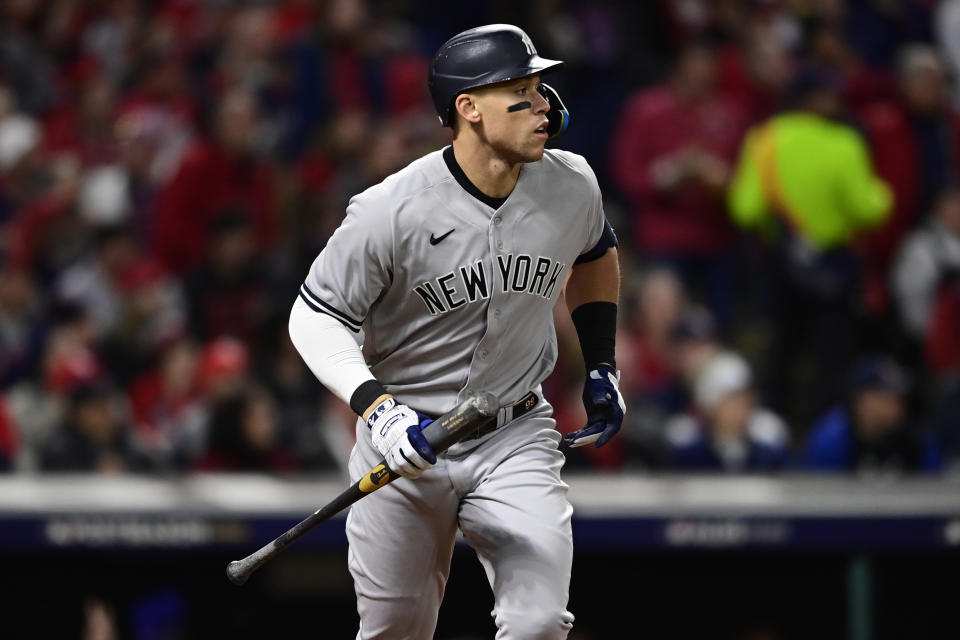 New York Yankees' Aaron Judge watches his home run against the Cleveland Indians during the third inning of Game 3 of a baseball AL Division Series, Saturday, Oct. 15, 2022, in Cleveland. (AP Photo/David Dermer)