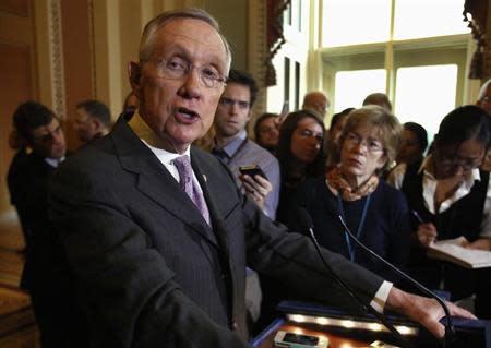 U.S. Senate Majority Leader Harry Reid (D-NV) speaks to the media following a Senate cloture vote on budget bill on Capitol Hill in Washington December 17, 2013. REUTERS/Yuri Gripas