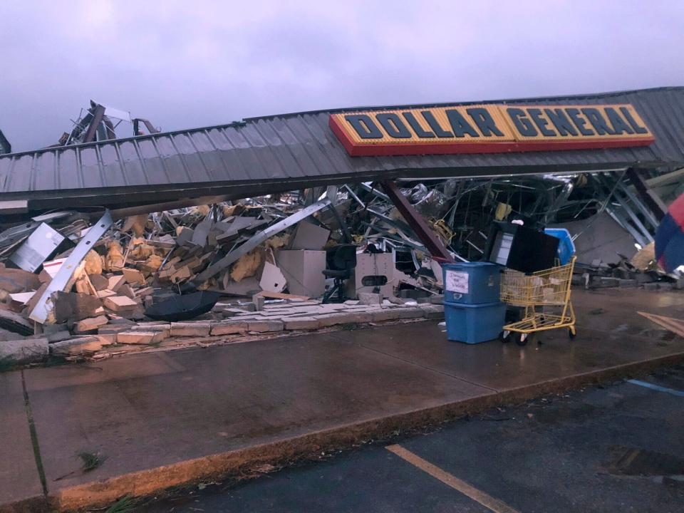 In this Tuesday, March 24, 2020 photo, a Dollar General store in Tishomingo, Miss., is completely destroyed after a suspected tornado swept through the area.