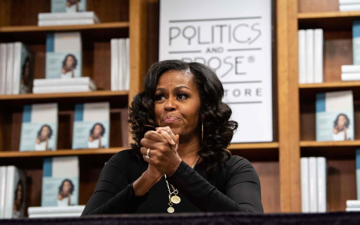 Michelle Obama said racism in the US was "exhausting" - AFP/GETTY IMAGES