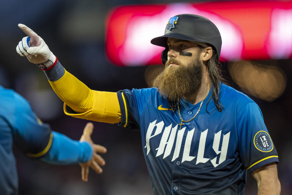 Philadelphia Phillies' Brandon Marsh reacts to his 2 RBI single during the third inning of a baseball game against San Francisco Giants, Friday, May 3, 2024, in Philadelphia. (AP Photo/Chris Szagola)