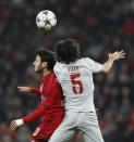 Bayer Leverkusen's Hakan Calhanoglu challenges Atletico Madrid's Tiago Mendes (R) during their Champions League round of 16, first leg soccer match in Leverkusen February 25, 2015. REUTERS/Wolfgang Rattay (GERMANY - Tags: SPORT SOCCER)