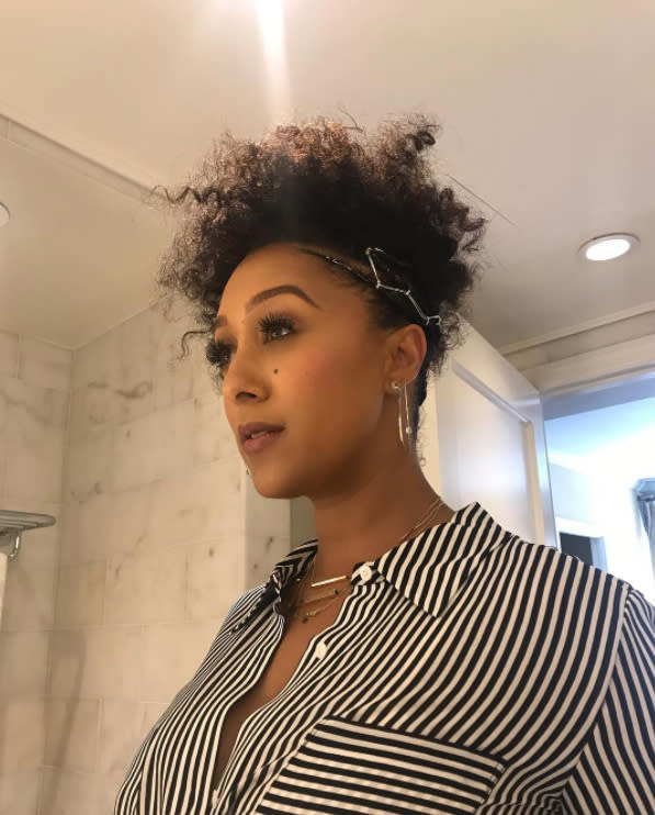 <p>Just look at that gaze. Even Tamera knows her curly braided updo by hairstylist Nikki Nelms is fly. (Photo: Nikkinelms/Instagram) </p>