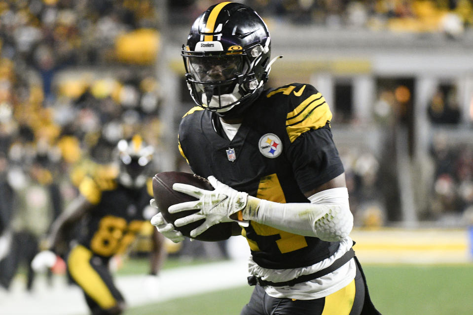 Pittsburgh Steelers wide receiver George Pickens (14) makes a catch and takes it in for a touchdown against the Cincinnati Bengals during the first half of an NFL football game, Sunday, Nov. 20, 2022, in Pittsburgh. (AP Photo/Don Wright)