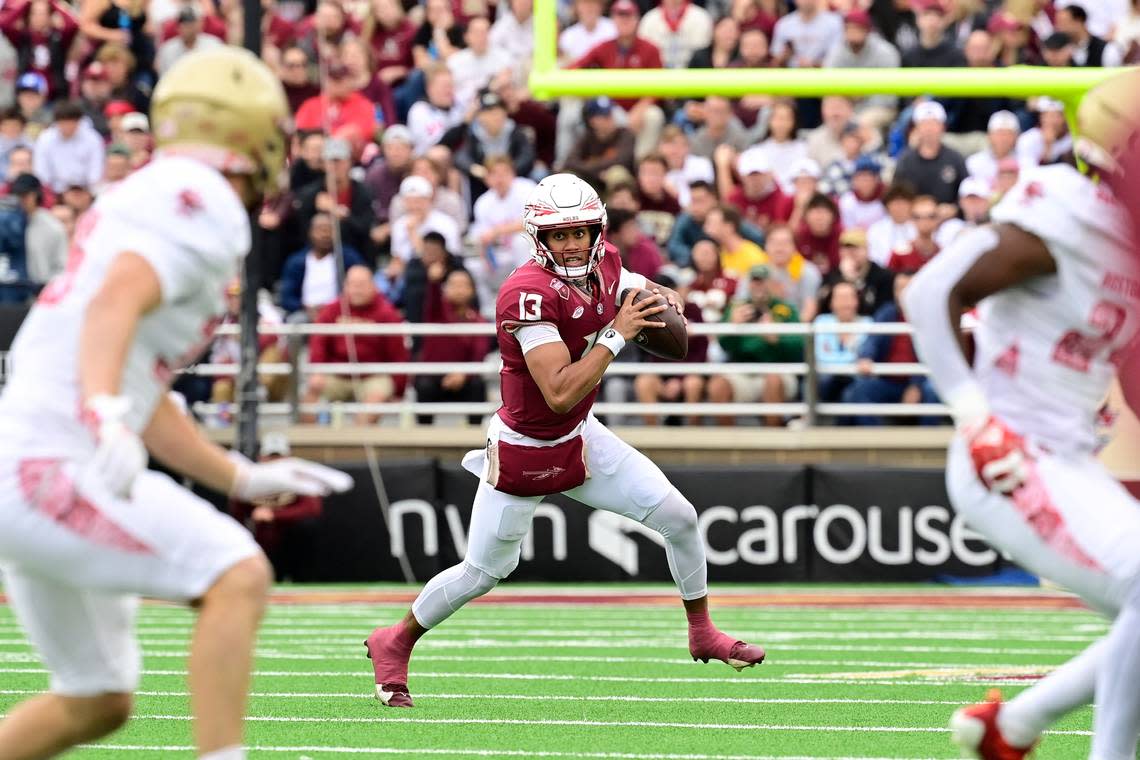 Sep 16, 2023; Chestnut Hill, Massachusetts, USA; Florida State Seminoles quarterback Jordan Travis (13) scrambles out of the pocket looking for a receiver during the second half against the Boston College Eagles at Alumni Stadium. Mandatory Credit: Eric Canha-USA TODAY Sports