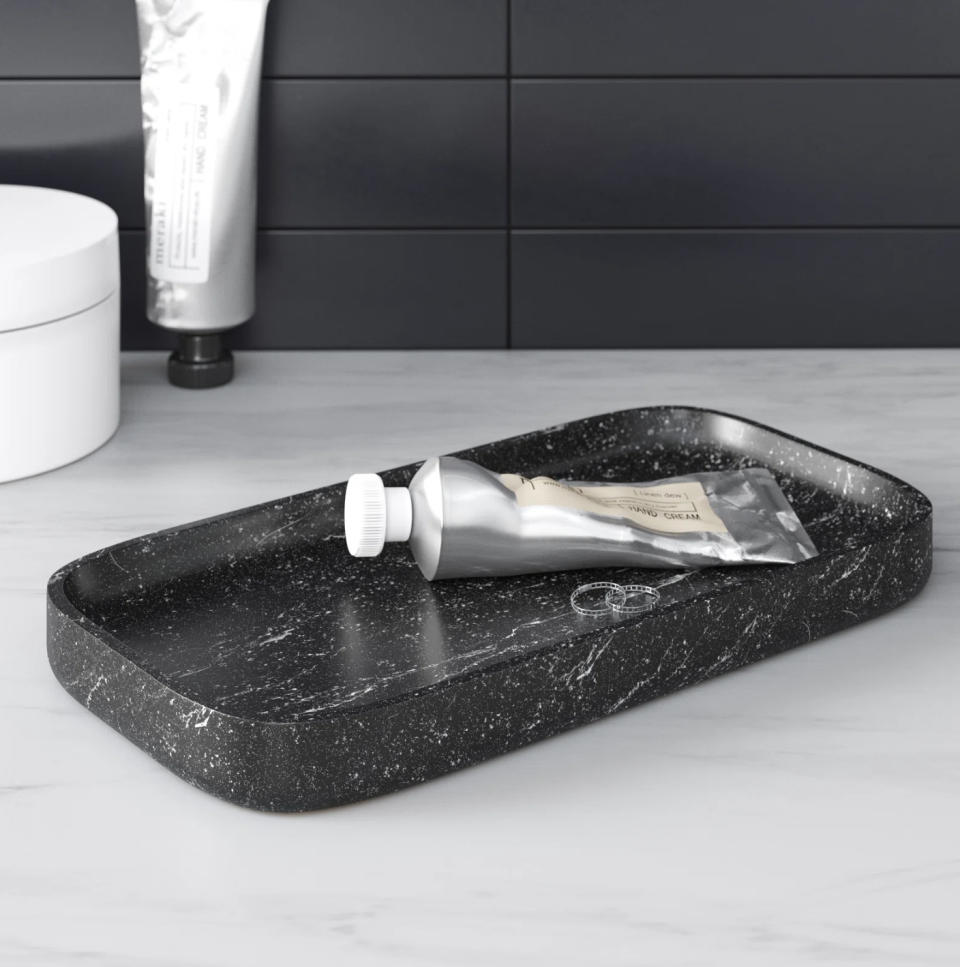 A black vanity tray