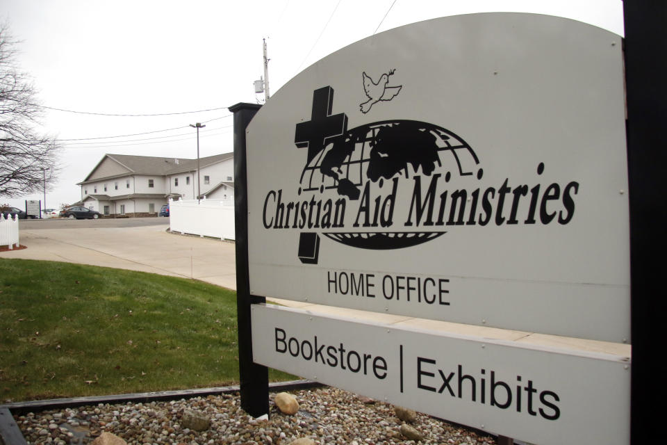 A sign for the Christian Aid Ministries offices is shown in Berlin, Ohio Thursday, Dec. 16, 2021. The remaining members of the U.S.-based missionary group who were kidnapped two months ago have been freed, according to the group and to Haitian police. (AP Photo/Tom E. Puskar)