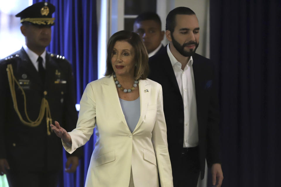 U.S. House Speaker Nancy Pelosi arrives for a meeting accompanied by El Salvador's President Nayib Bukele in San Salvador, El Salvador, Friday, Aug. 9, 2019. Pelosi is part of a U.S. congressional delegation on a Central American trip that seeks to explore the the causes of immigration and solutions. (AP Photo/Salvador Melendez)