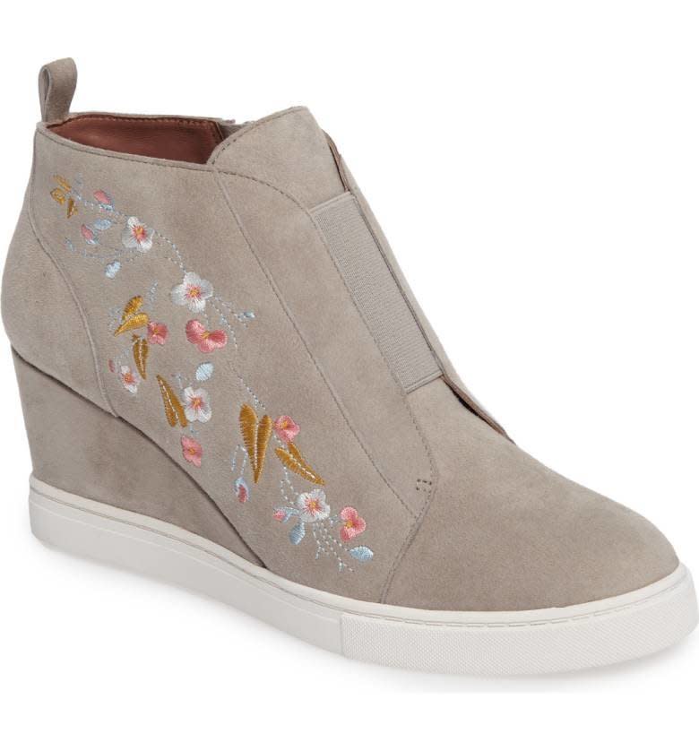 Shop it <a href="http://shop.nordstrom.com/s/linea-paolo-felicia-ii-wedge-bootie-women/4699122?origin=keywordsearch-personalizedsort&amp;fashioncolor=GREY%20EMBROIDERY%20SUEDE" target="_blank"><strong>here</strong></a>.